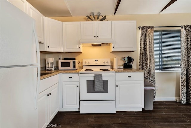 kitchen featuring white cabinets and white appliances