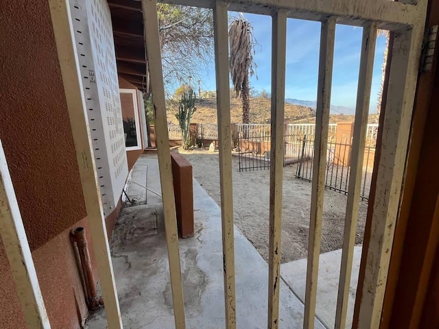 doorway to outside with a mountain view