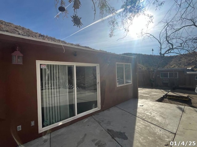 view of home's exterior with a patio area