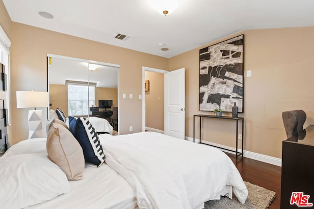 bedroom featuring hardwood / wood-style floors