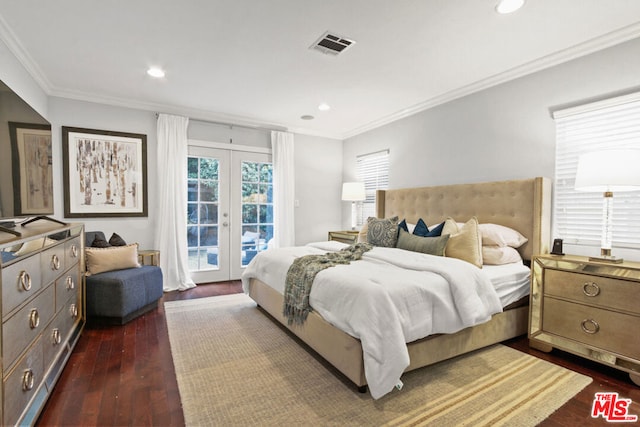 bedroom featuring dark hardwood / wood-style flooring, access to outside, ornamental molding, and french doors