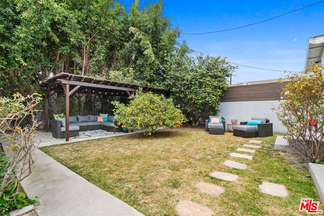 view of yard with outdoor lounge area, a pergola, and a patio