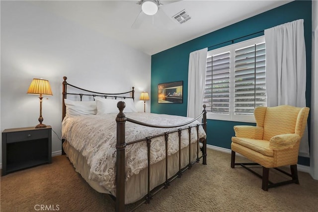 bedroom with ceiling fan and carpet floors