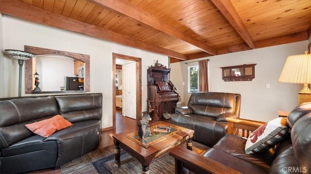 living room with beam ceiling and wood ceiling