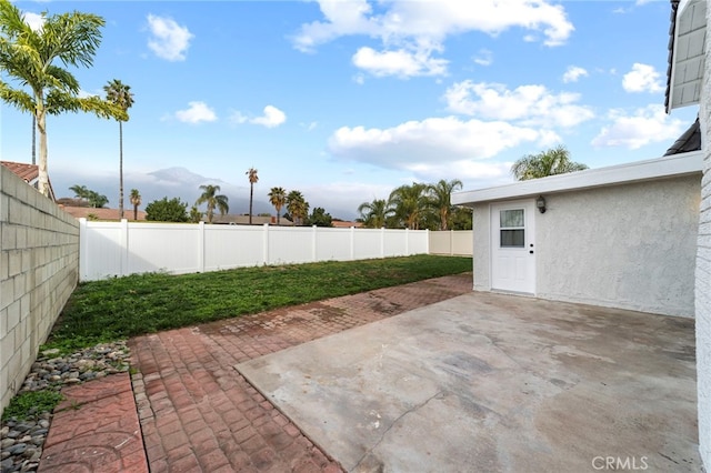 view of patio / terrace featuring a mountain view