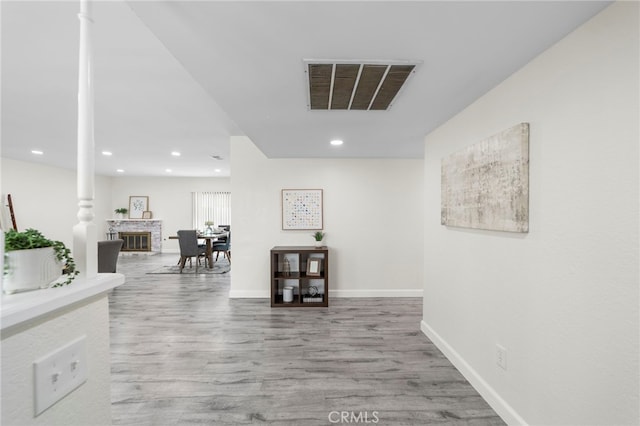 corridor featuring light hardwood / wood-style floors