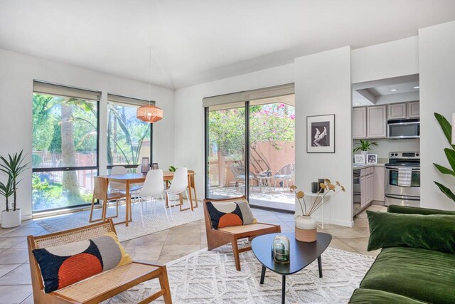 living room with light tile patterned floors