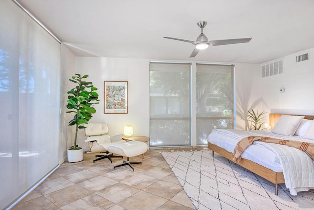 unfurnished bedroom featuring expansive windows