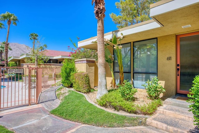 property entrance featuring a mountain view