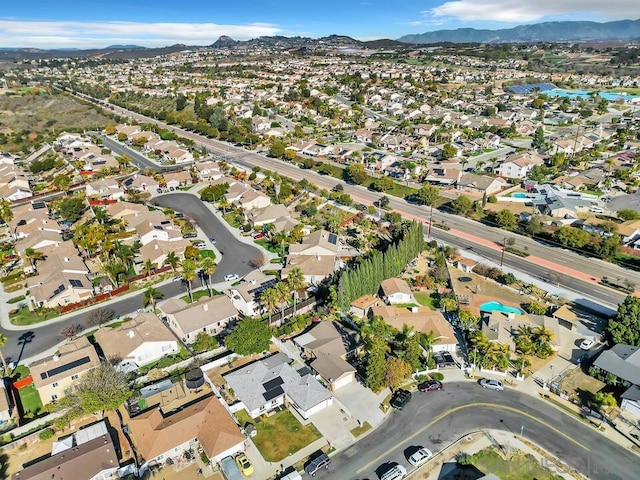 drone / aerial view featuring a mountain view