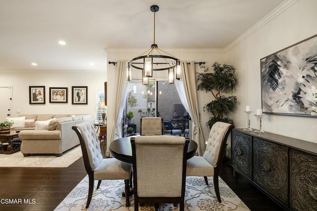 dining room featuring a notable chandelier, crown molding, and dark hardwood / wood-style floors