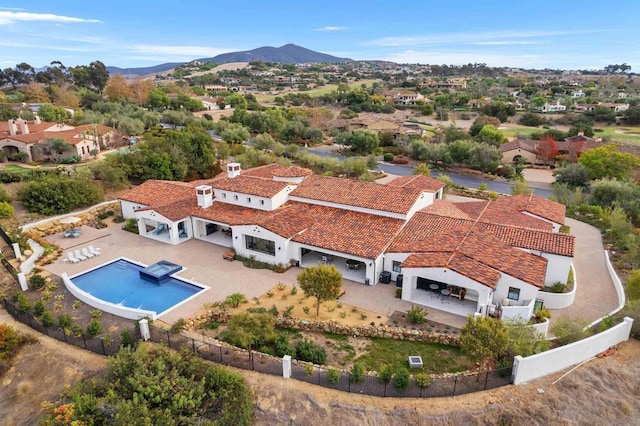 drone / aerial view featuring a mountain view