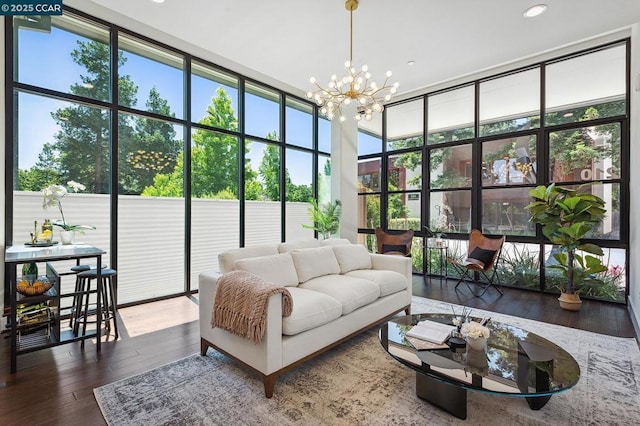 sunroom with a chandelier