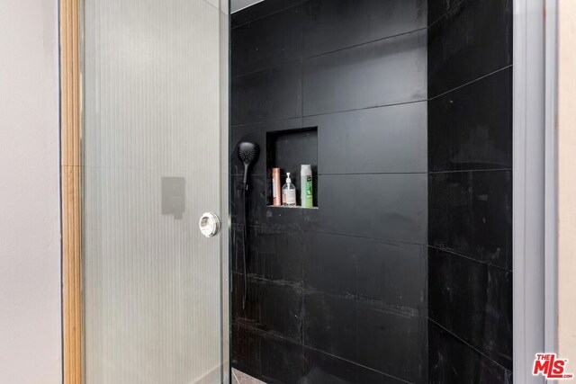 bathroom featuring walk in shower