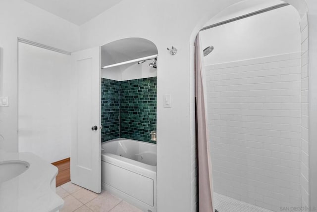 bathroom with tile patterned floors