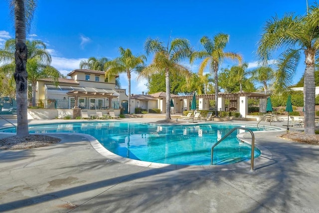 view of swimming pool with a patio area