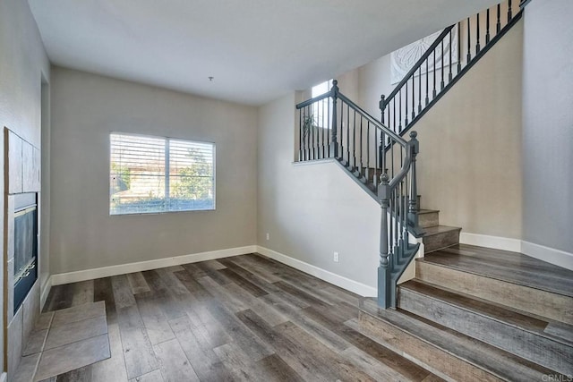 staircase featuring hardwood / wood-style flooring