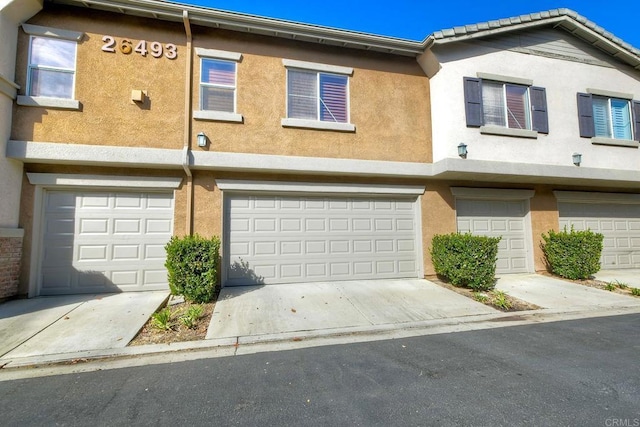 view of property featuring a garage