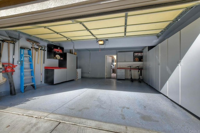 garage featuring a garage door opener