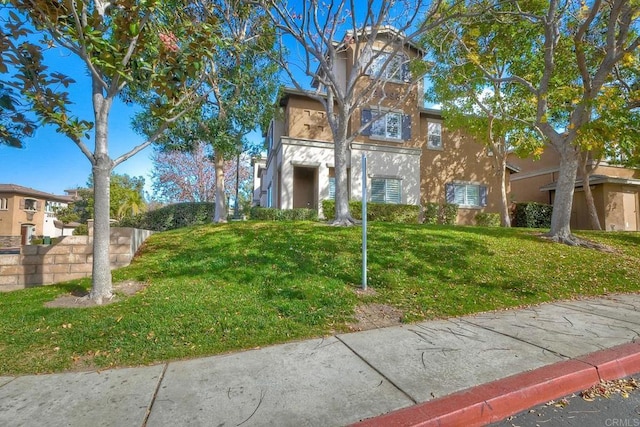 exterior space featuring a front yard