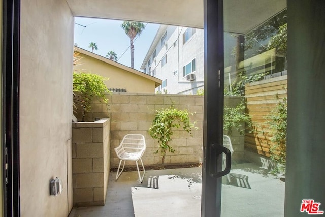 entryway with concrete flooring