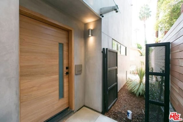 exterior space with wooden walls