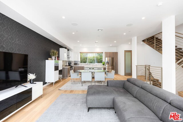 living room with light wood-type flooring