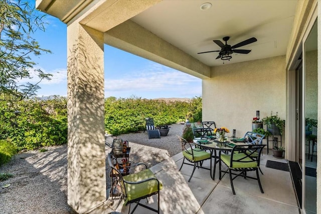 view of patio with ceiling fan