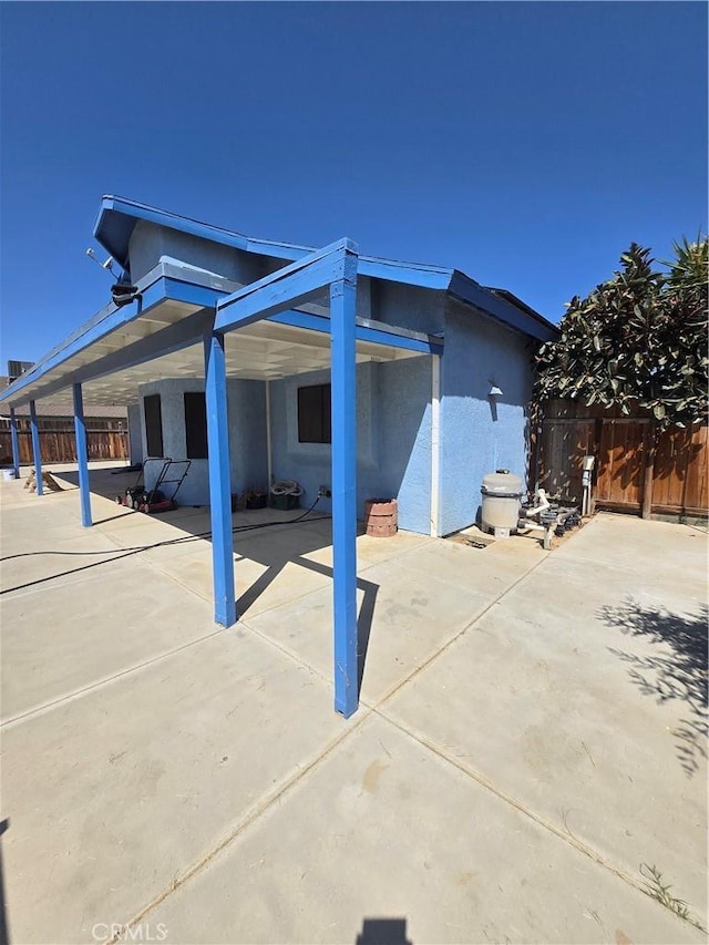 exterior space with a patio area