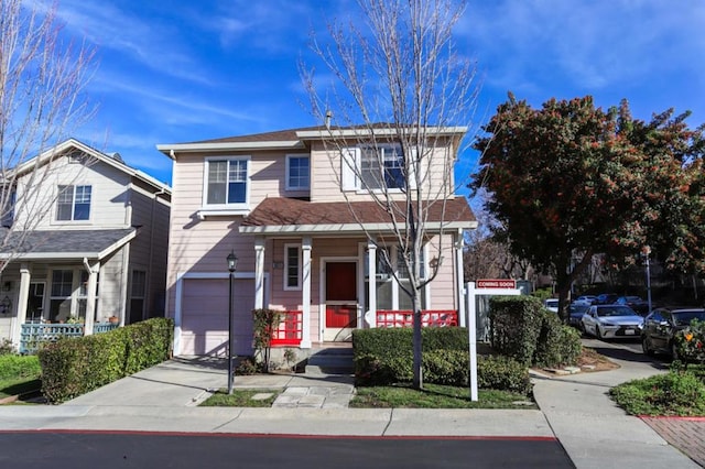 front facade with a garage