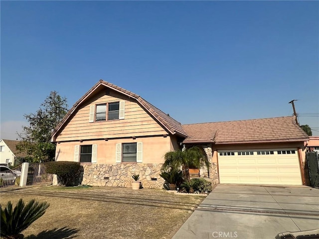 front of property featuring a garage