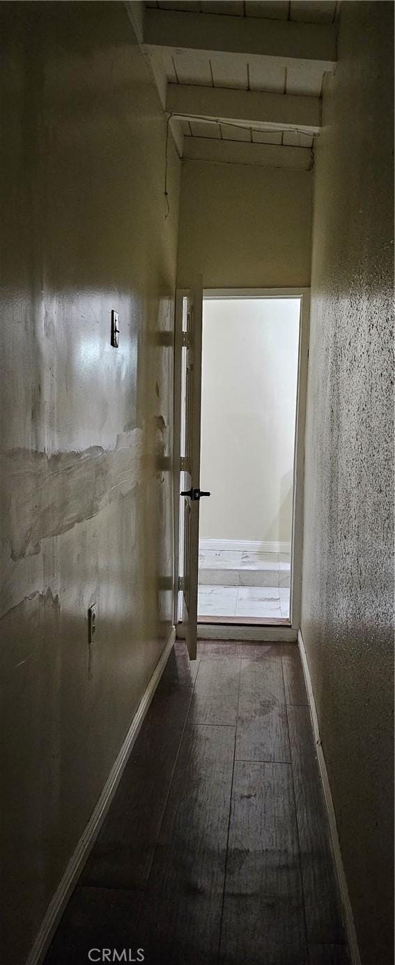 bathroom with hardwood / wood-style floors