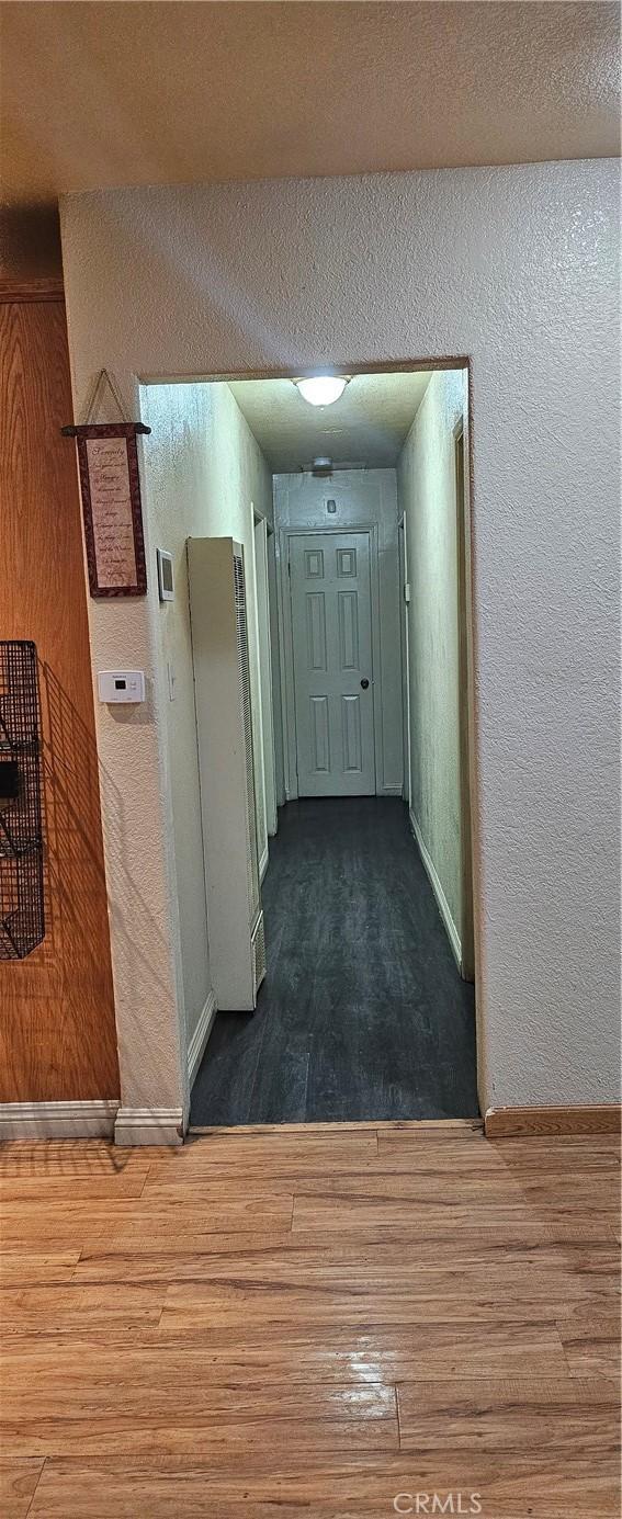 hallway featuring hardwood / wood-style floors