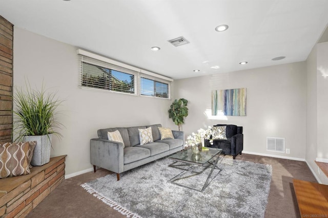 living room featuring dark colored carpet