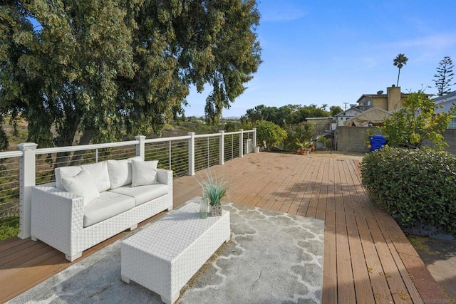 wooden deck with an outdoor hangout area