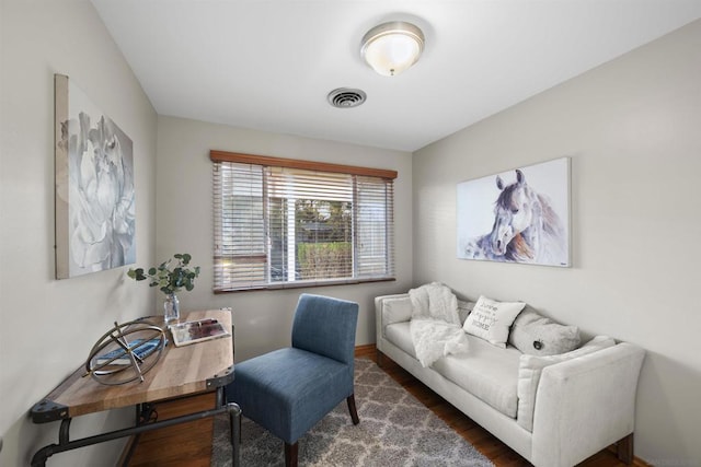 living room featuring dark hardwood / wood-style flooring