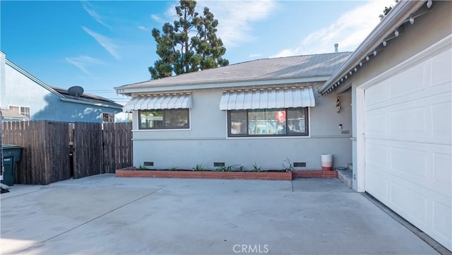 view of home's exterior with a garage