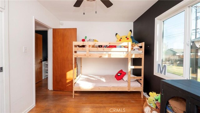 bedroom featuring wood-type flooring