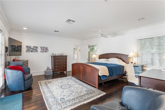 bedroom with ceiling fan, dark hardwood / wood-style flooring, and ornamental molding