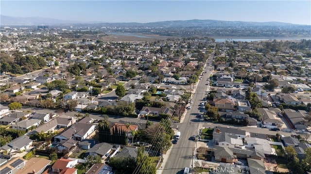 drone / aerial view featuring a mountain view