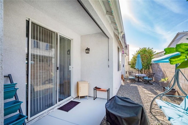 view of patio with a grill