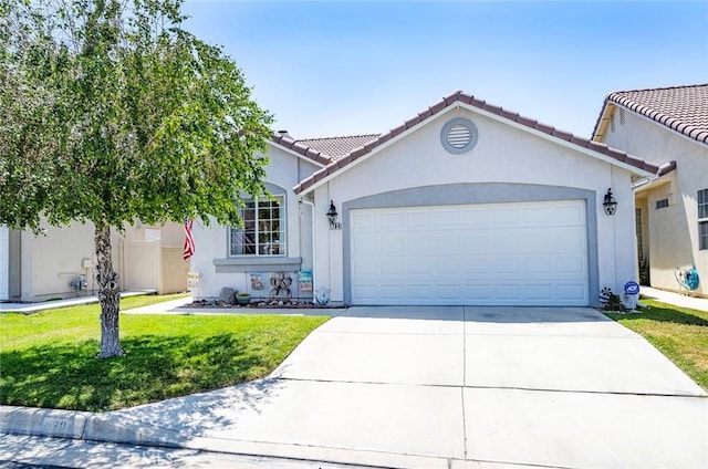 view of front facade featuring a garage and a front yard