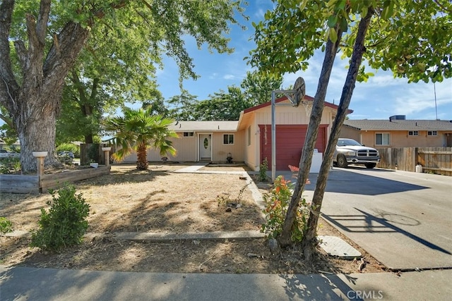 ranch-style home with a garage