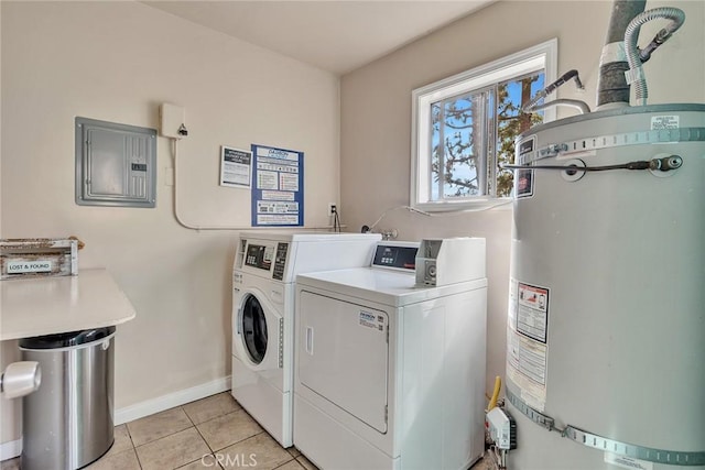 washroom with separate washer and dryer, light tile patterned floors, electric panel, and strapped water heater