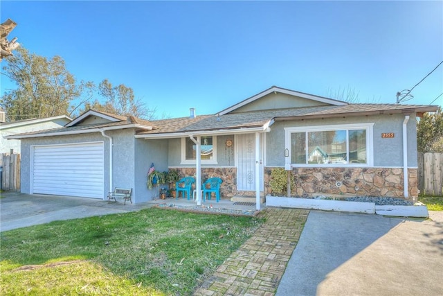 single story home featuring a garage and a front lawn