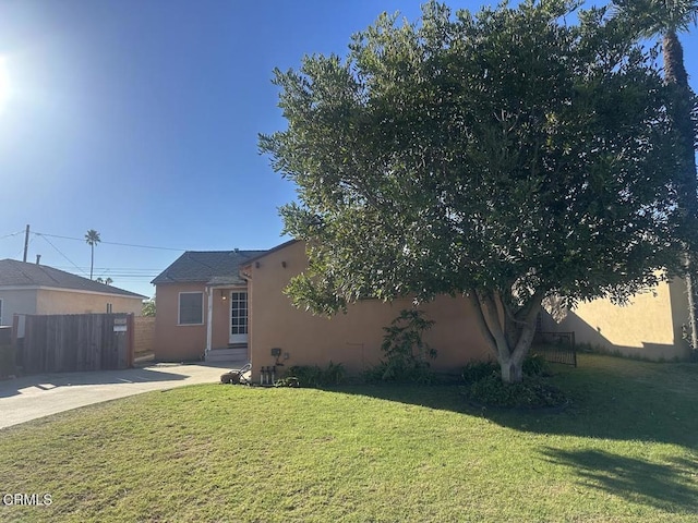 exterior space with a front lawn