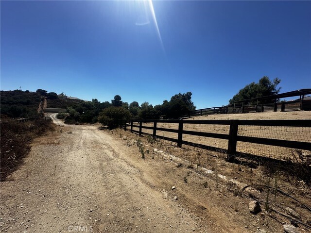 view of street featuring a rural view