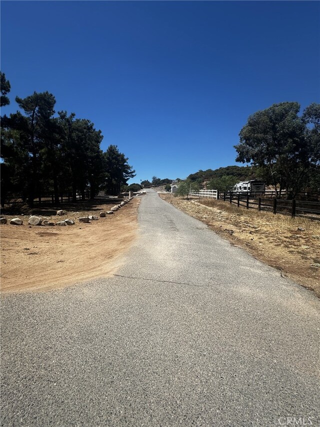 view of street featuring a rural view