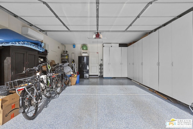 garage with black refrigerator with ice dispenser and a garage door opener