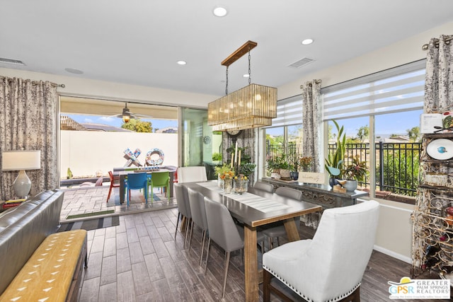 dining room featuring ceiling fan